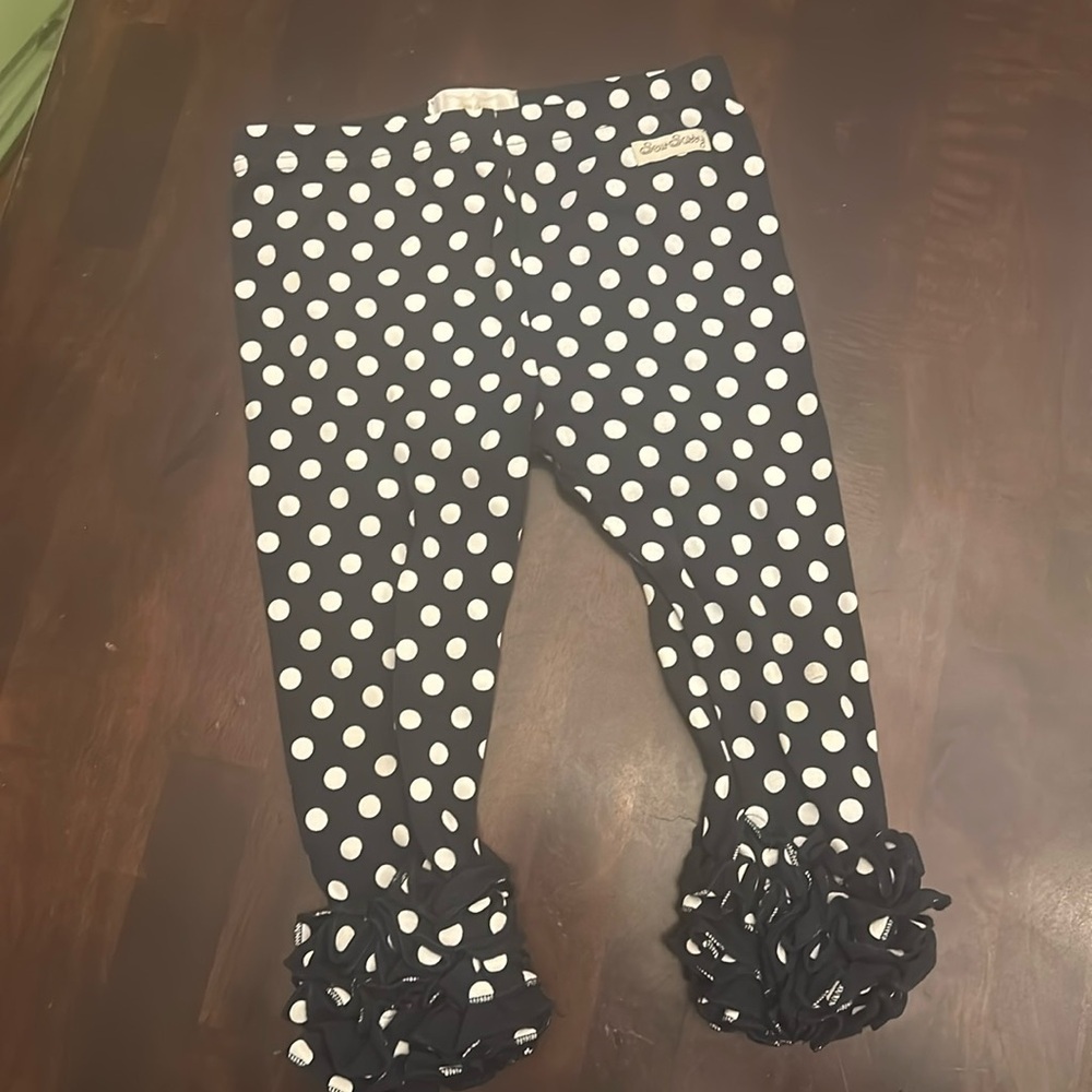 Size 8 sew sassy frilly leggings.